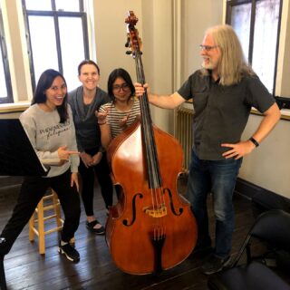 Saw Peep Pan-Asian Ensemble members Sheryll, Divya, and Roxell with one of our new members, Angela, displaying her magnificent bass!

#Bass #Louisville #AsianMusic #AsianAmericanMusic 

Photo credit: Jon Silpayamanant